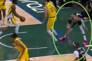 崴脚+膝盖太过舒展？？？？？？字母哥扣篮落地失衡 捂着左腿缺战小节_24直播网